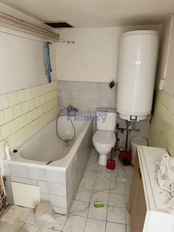 Prodej podílu pozemku pro bydlení, Pouzdřany, Hlavní, 902 m2